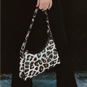 Leopard mini shoulder purse.